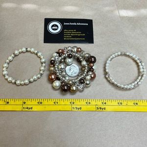 Set of three faux pearl bracelets, white, brown tones, silver/gold toned metal